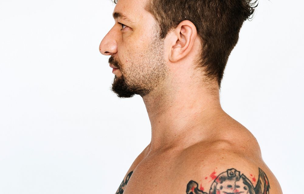 Man with tattoo studio portrait