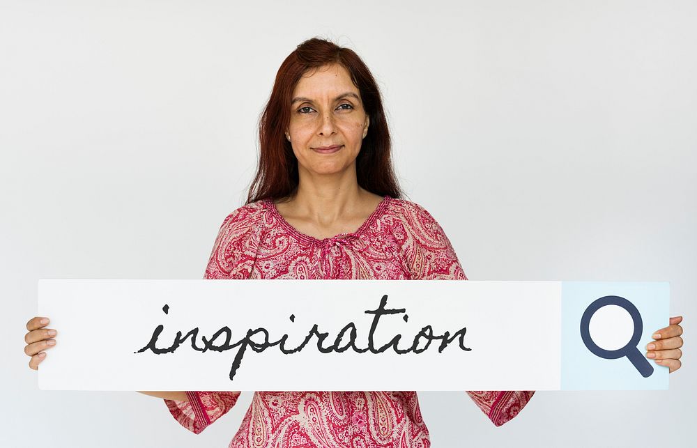 Mature woman holding inspiration banner