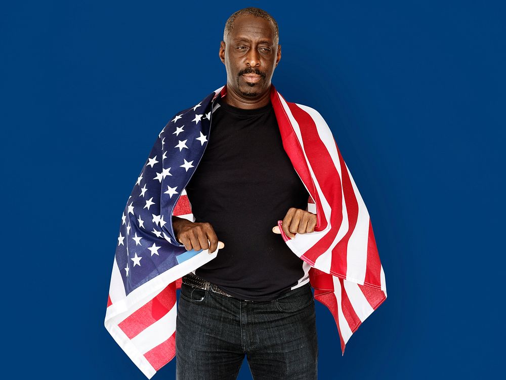 Adult Man Covered with American Flag Nationality Studio Portrait