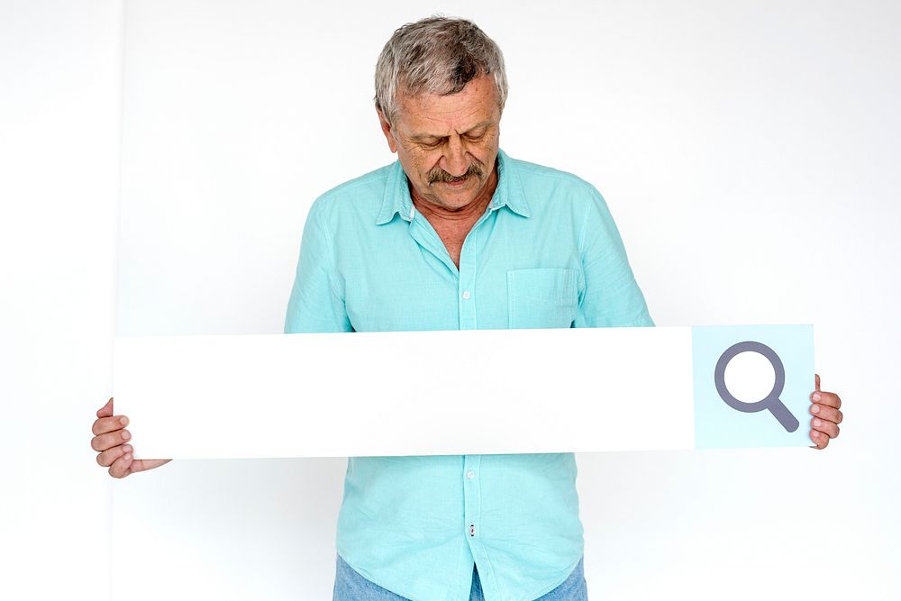 Man standing and holding billboard for photoshoot