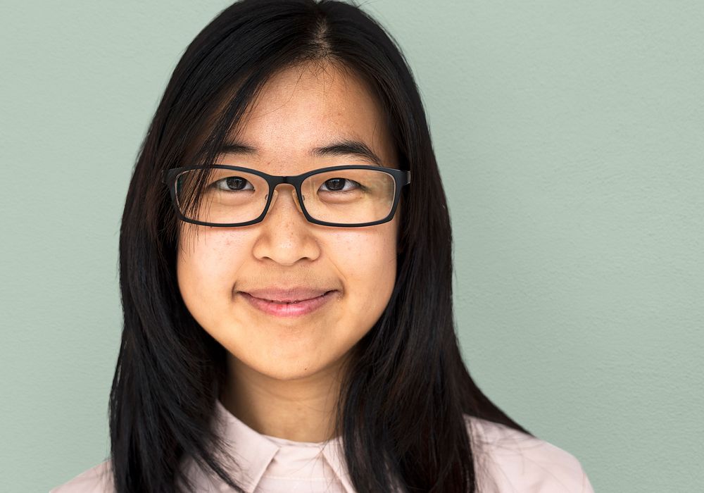 Young Asian Adult Woman Smile Face Studio Portrait