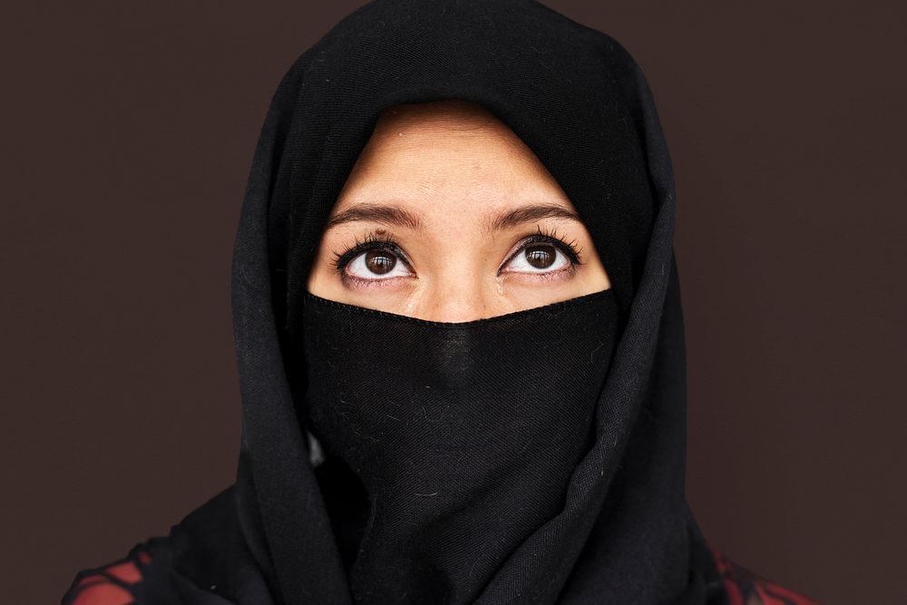 Middle eastern woman in hijab studio portrait