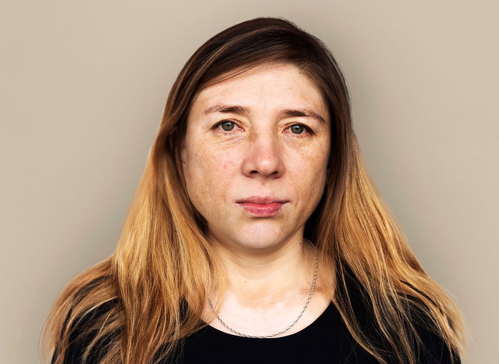 Adult Woman Serene Face Expression Studio Portrait