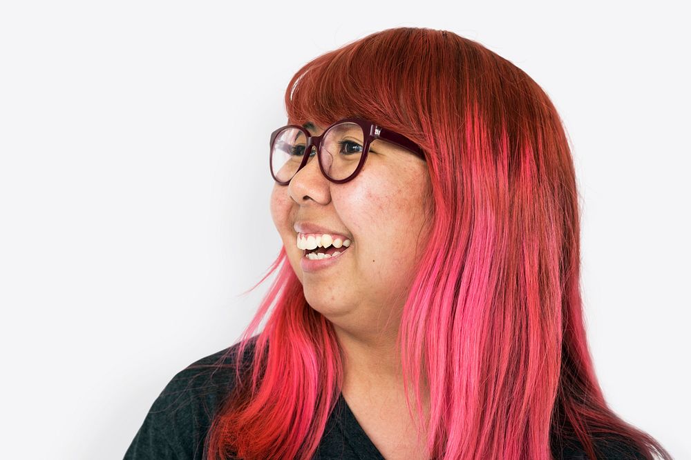 Asian girl pink hair smiling