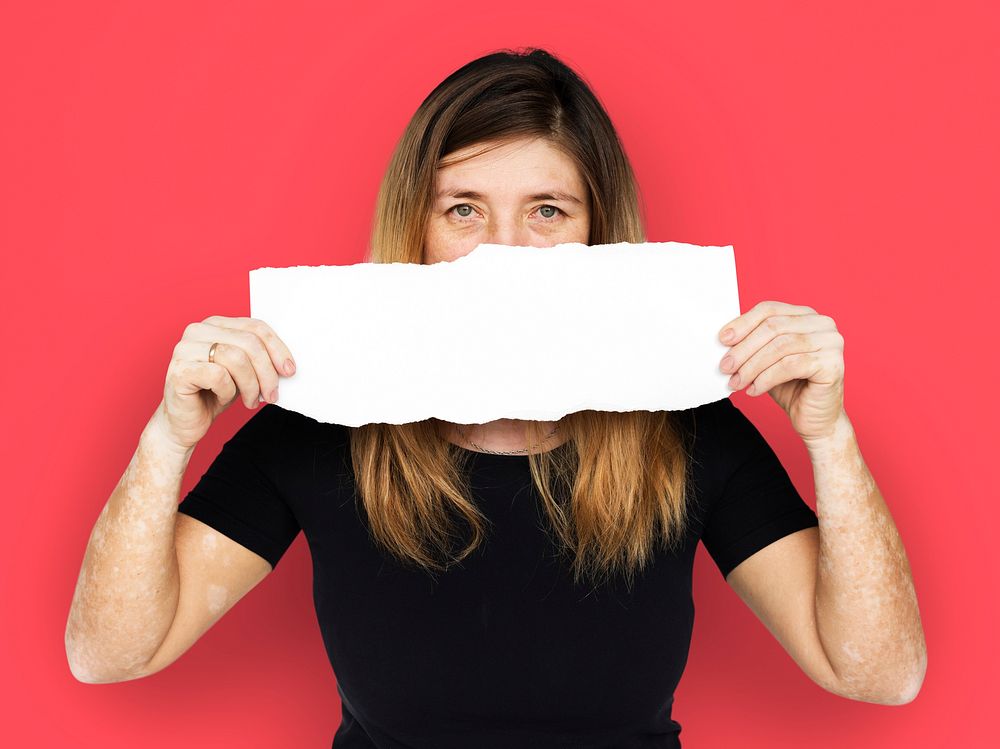 Adult Woman Holding Blank Paper Covered Face Studio Portrait