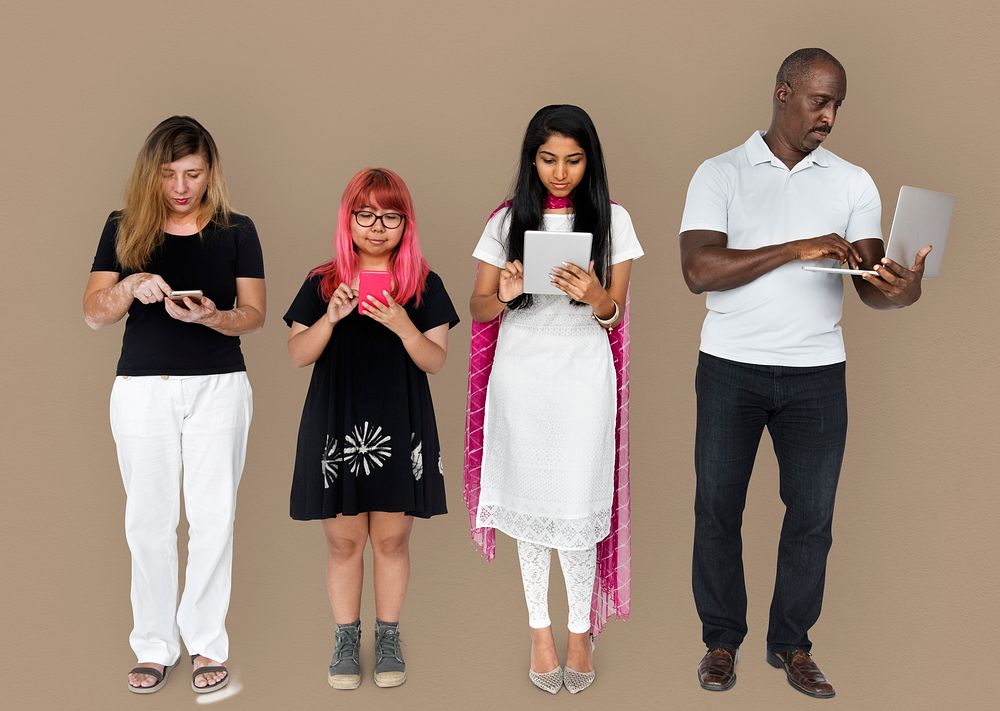 Group of people using digital devices technology