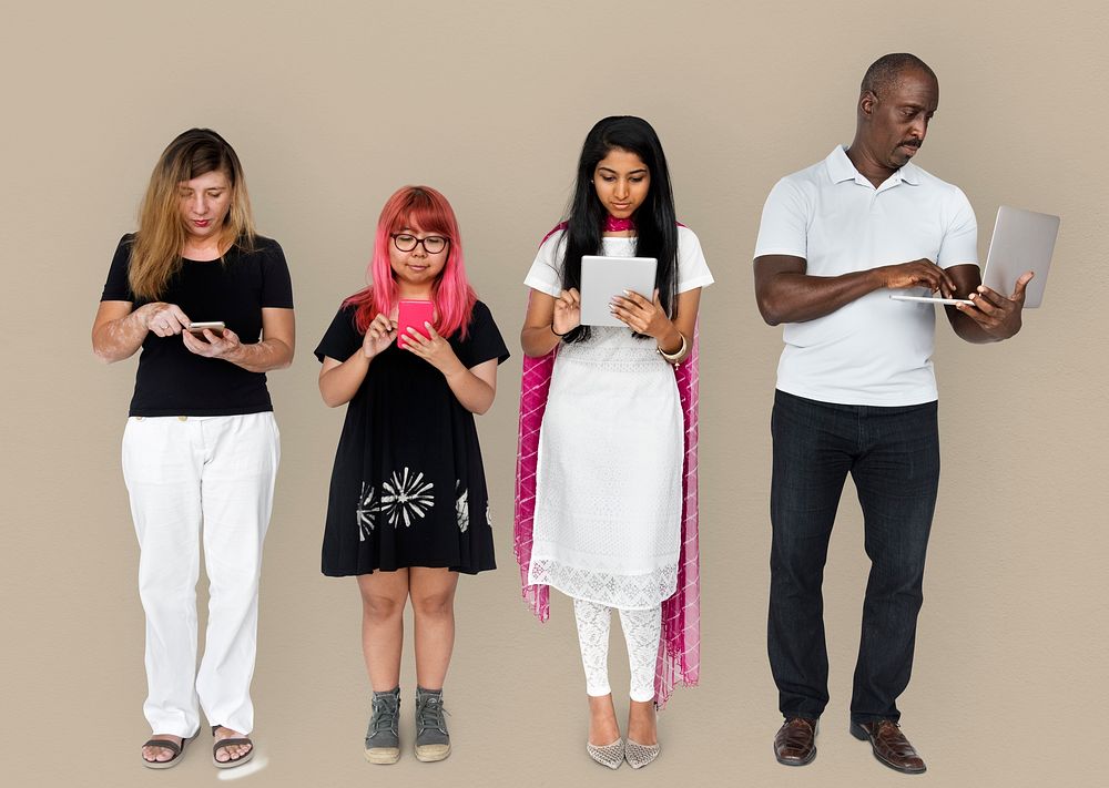 Group of people using digital devices technology