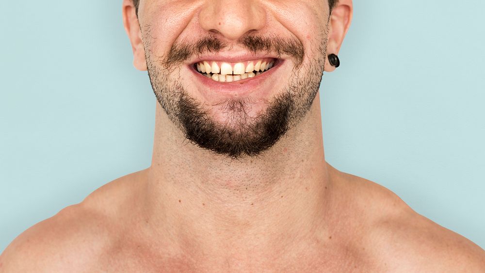 Adult man smiling studio portrait