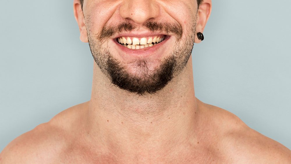 Adult man smiling studio portrait