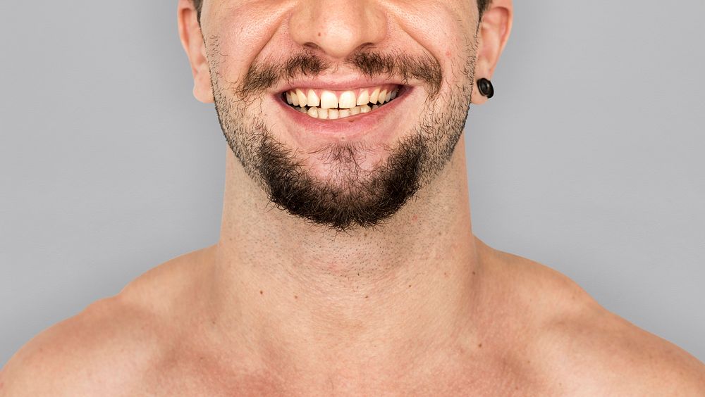 Adult man smiling studio portrait