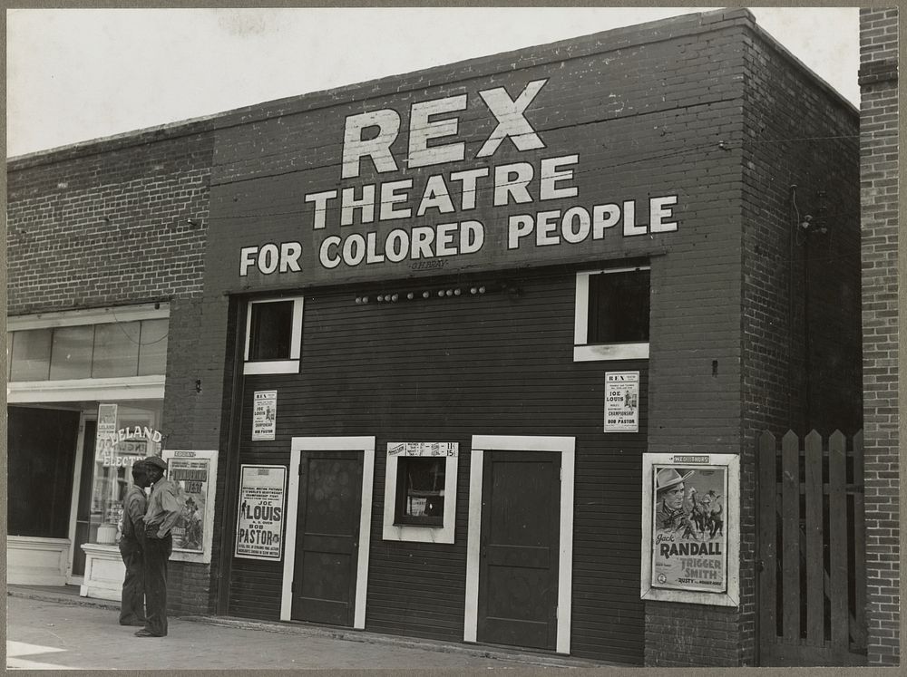 Leland, Miss., in the Delta area. The Rex theatre for  people by Dorothea Lange