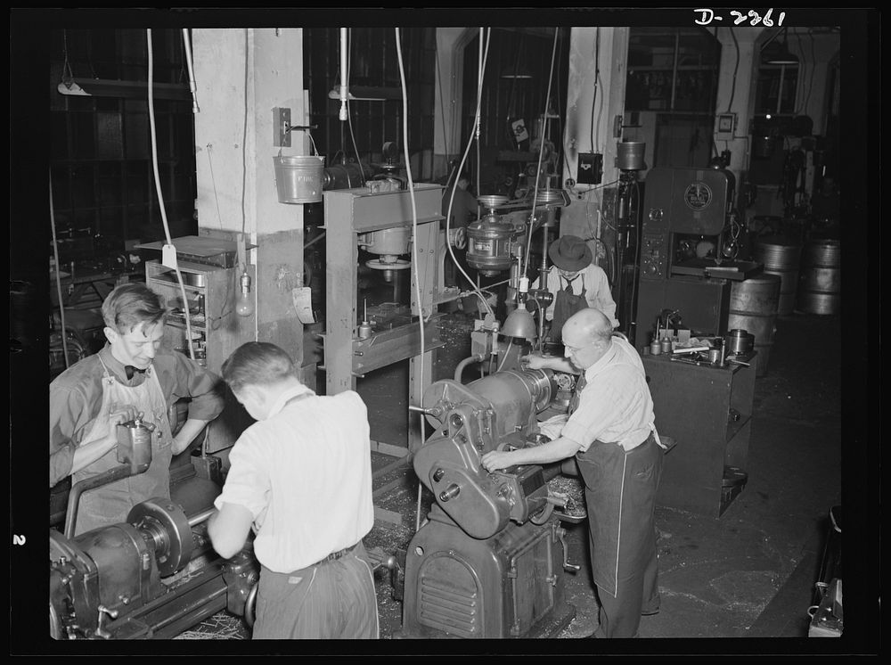 Bantam, Connecticut. One of the busiest sections of the Warren McArthur plant is the toolroom, with lathes turning for…