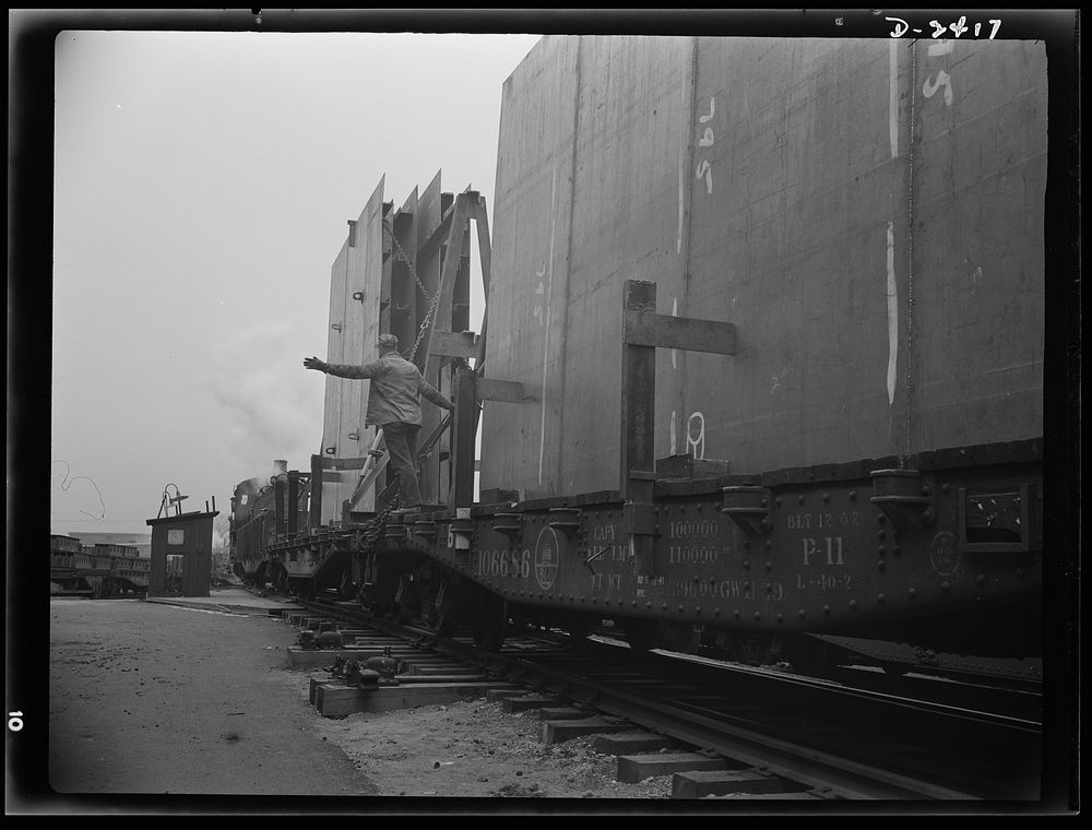 Shipbuilding. "Liberty" ships. These flatcars loaded with prefabricated and assembled sections for ships under construction…