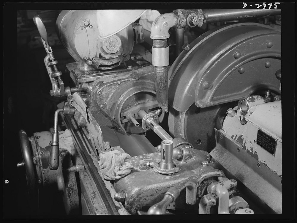 Conversion. Electric shaver plant. This Norton type C six-inch semi-automatic cylindrical grinder in a New England plant…
