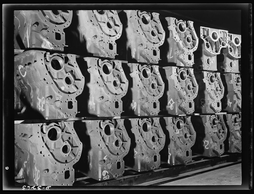 Engine blocks for the Army's new halftrac scout cars. They represent the latest and best thought in automotive foundry and…
