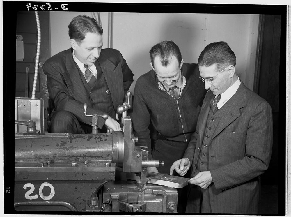 Subcontracting. Passaic home workshop pool. Executives of the Howe Machinery Company, Passaic, New Jersey, discuss details…