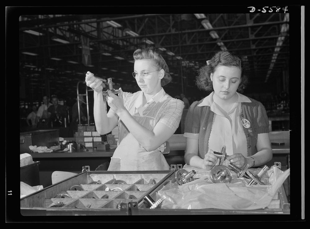 Production. Aircraft engines. Hundreds of gears pass through the expert hands of Dorothy Miller and Sylvia Dreiser during…