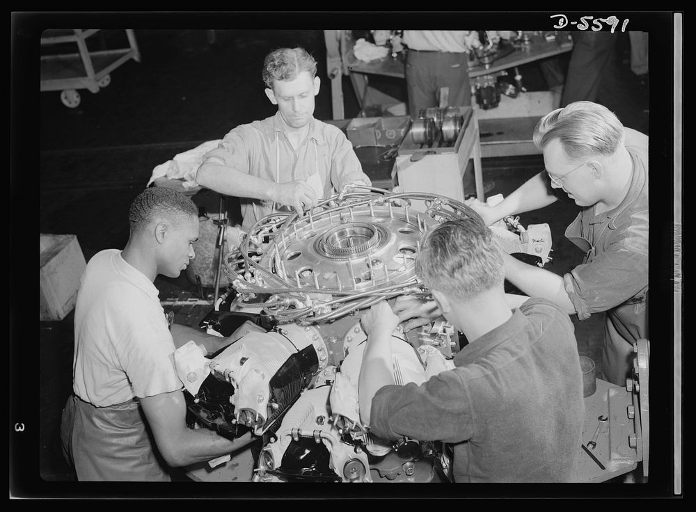 Production. Aircraft engines. Typifying American democracy at work, four soldiers of the production front assemble an…