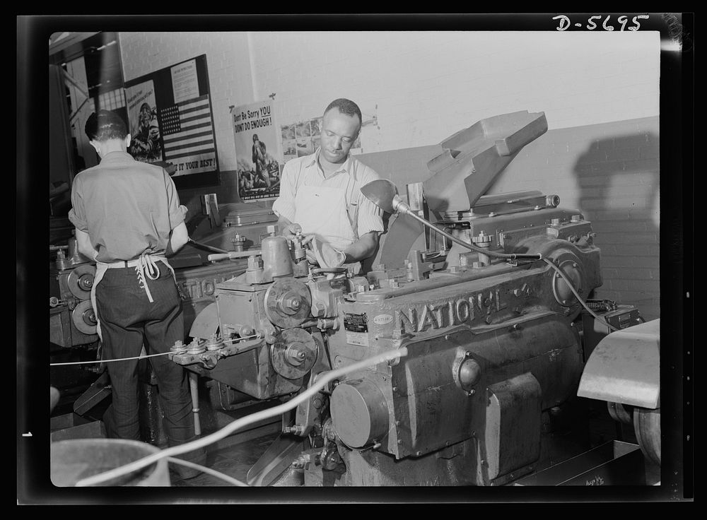 Production. Willow Run bomber plant. An experienced African American worker at the Willow Run bomber plant operates a cold…
