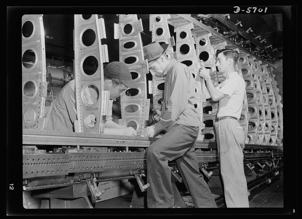 Production. Willow Run bomber plant. The outer wing panel of a bomber undergoes assembly in the giant Willow Run plant. When…