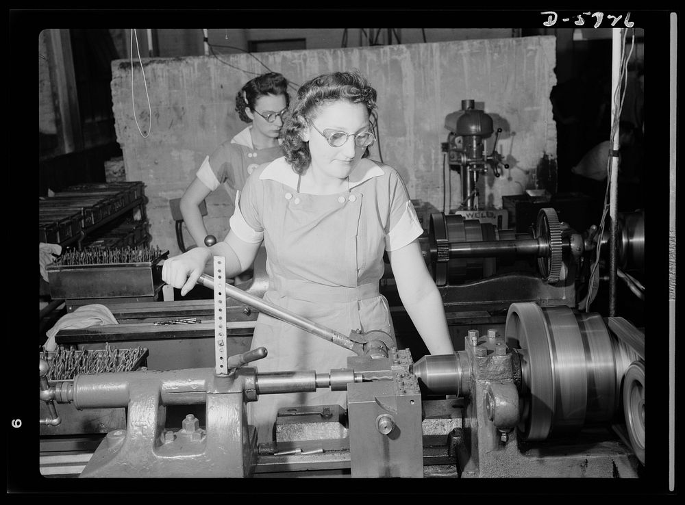 Women in industry. Tool  production. Two of nearly 1,000 women who "keep 'em rolling" in a large Midwest drill and tool…
