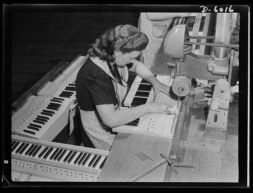Conversion. Pianos to airplane motors. A pretty girl surrounded by melody! Employed by a Chicago piano factory which has…