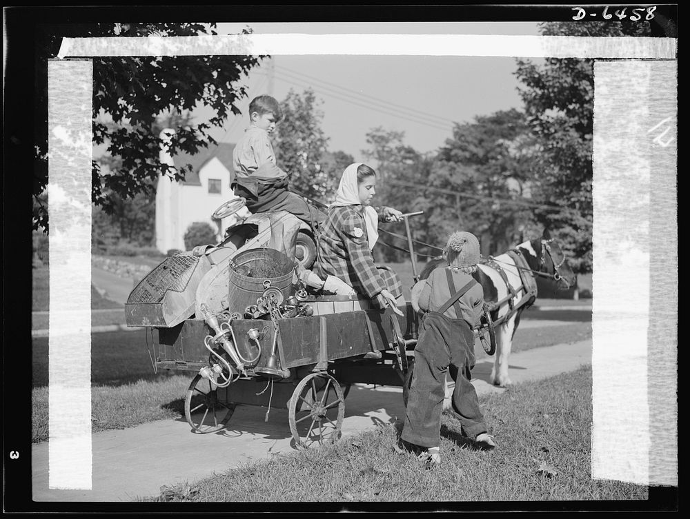 Manpower, junior size. The charge of the scrap brigade in Roanoke, Virginia includes such methods of collection as this pony…