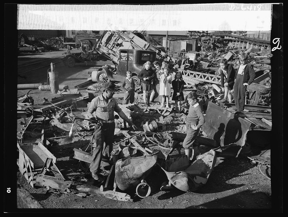 Manpower, junior size. Proud young fighters in Uncle Sam's junior army visit a scrap yard in Roanoke, Virginia to see for…