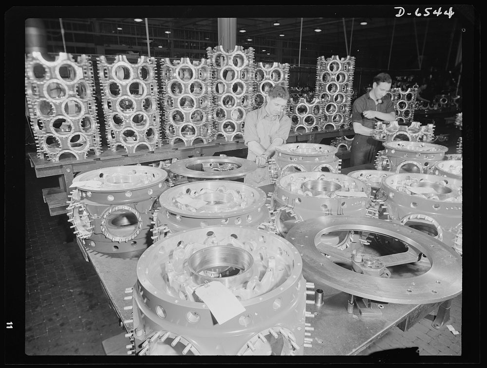 Production. Pratt and Whitney airplane engines. Stud bolts are installed on power cases for Pratt and Whitney airplane…