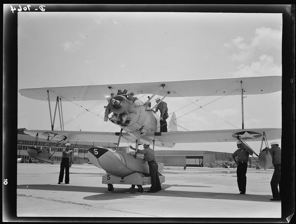 Naval air base, Corpus Christi, Texas. Last minute check-up is made by a sailor at the naval air base in Corpus Christi…