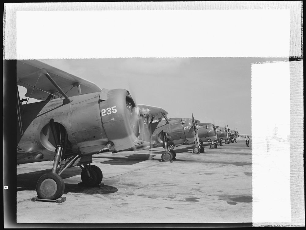Naval air base, Corpus Christi, Texas. Lined up and looking eager for flight are Navy fighter planes at the Navy Air Base in…
