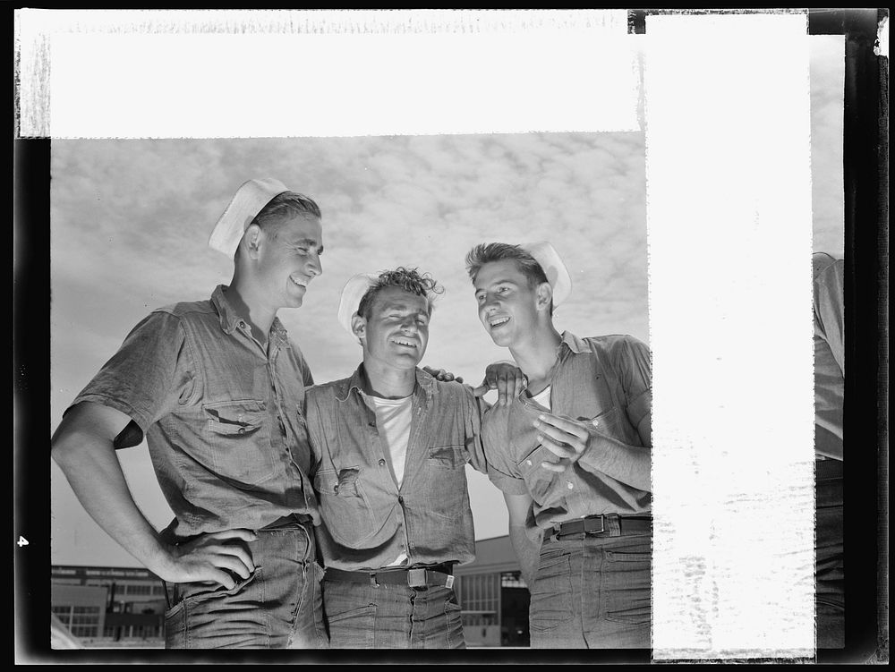 Naval air base, Corpus Christi, Texas. "And so he says to me...." sailor mechanics at the naval air base in Corpus Christi…