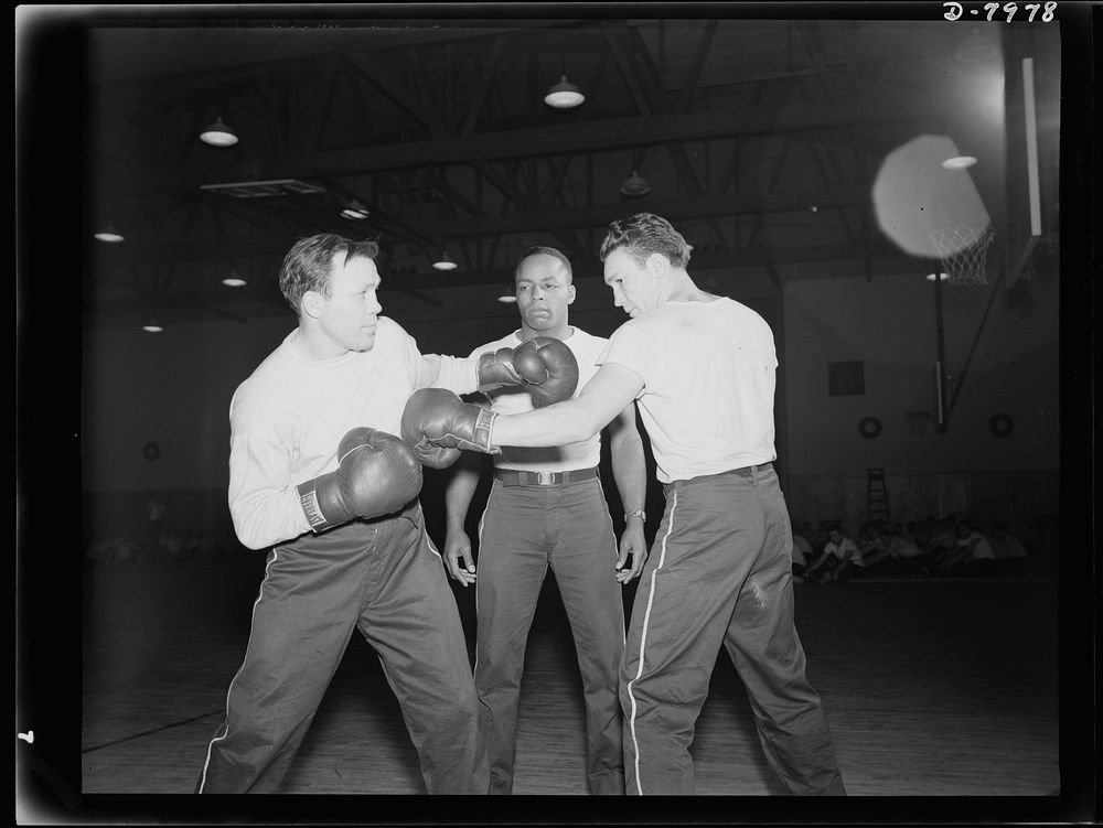 Manhattan Beach Coast Guard training station. Lou Ambers, former world's lightweight champion, sparring with Marty Servo…