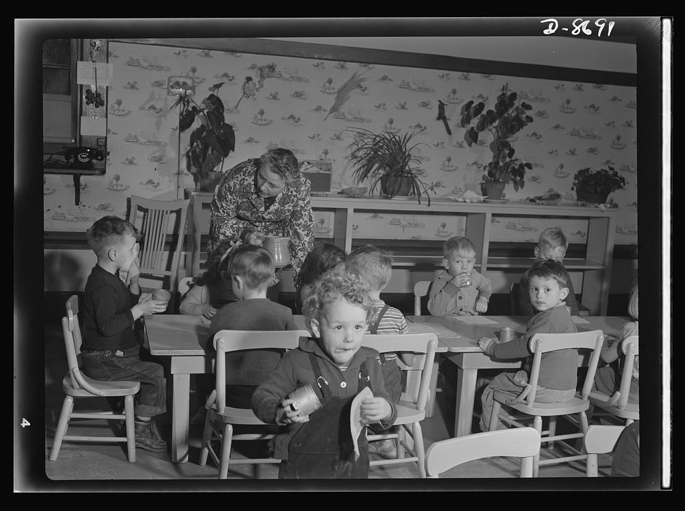 War workers' nursery. A mid-morning tomato juice is thoroughly appreciated by these war workers' children who attend an…