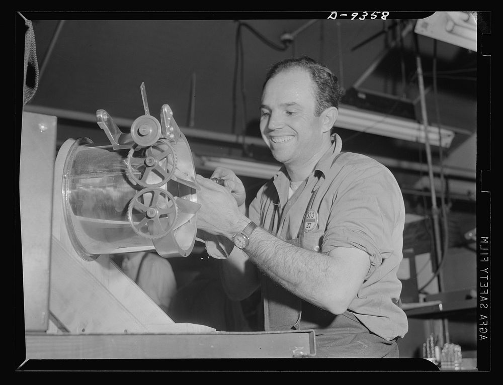 Baseball players in war production. "Frenchy" Uhalt, center fielder with Hollywood Club, puts his gloves aside to work in…