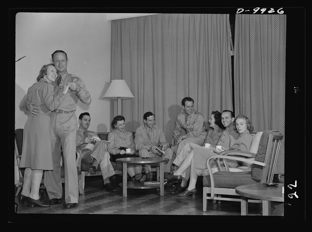 Reciprocal aid. American nurses and officers enjoy themselves in nurses' quarters of a new 3,000,000 dollar hospital…