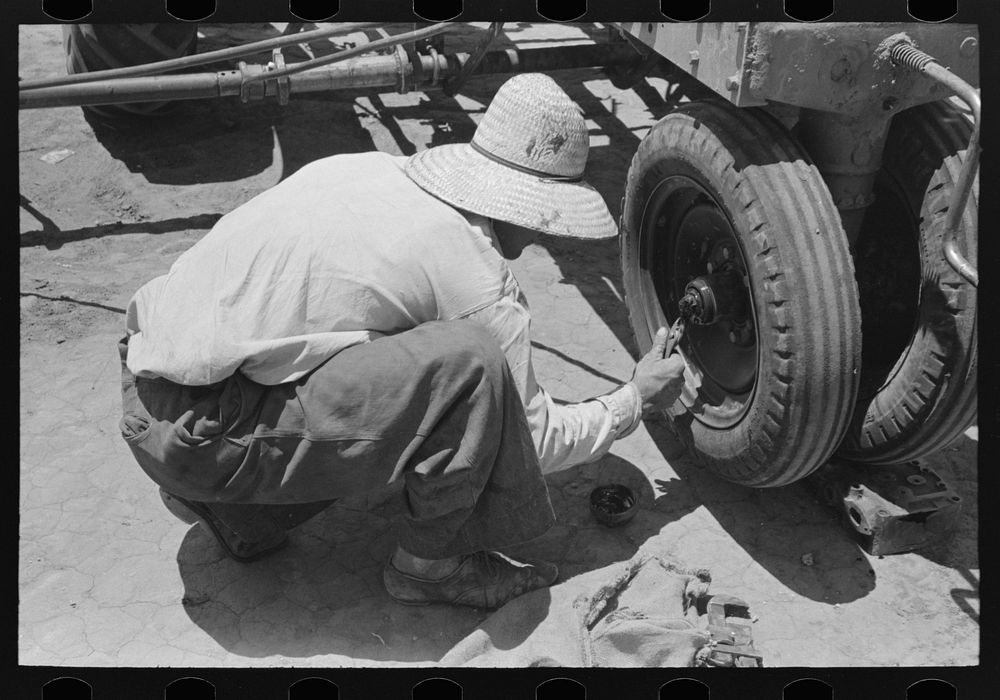 Day laborer putting cotter pin Free Photo rawpixel