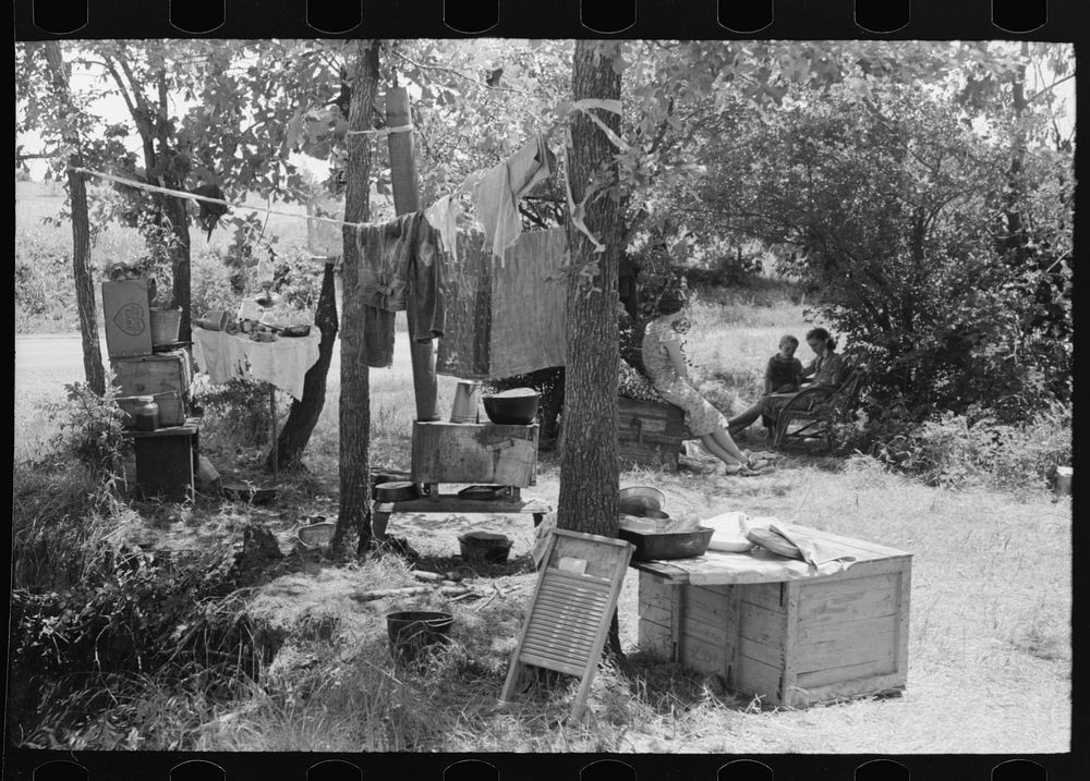 [Untitled photo, possibly related to: Camp by the roadside near Spiro, Oklahoma. This family did agricultural day labor to…