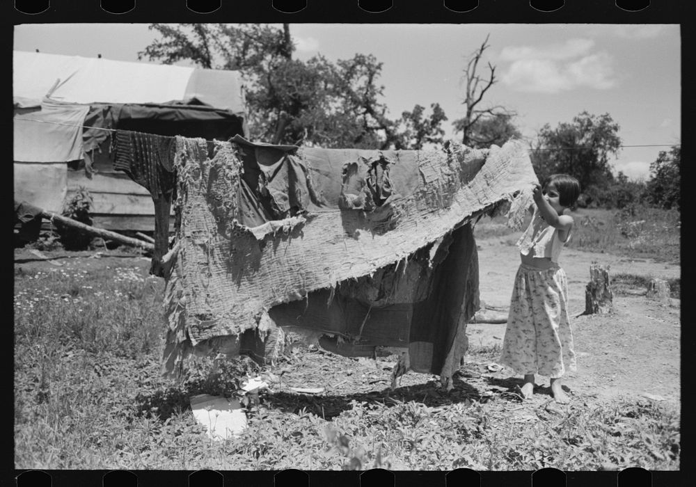 Bedding of agricultural workers' family near Vian, Sequoyah County, Oklahoma by Russell Lee