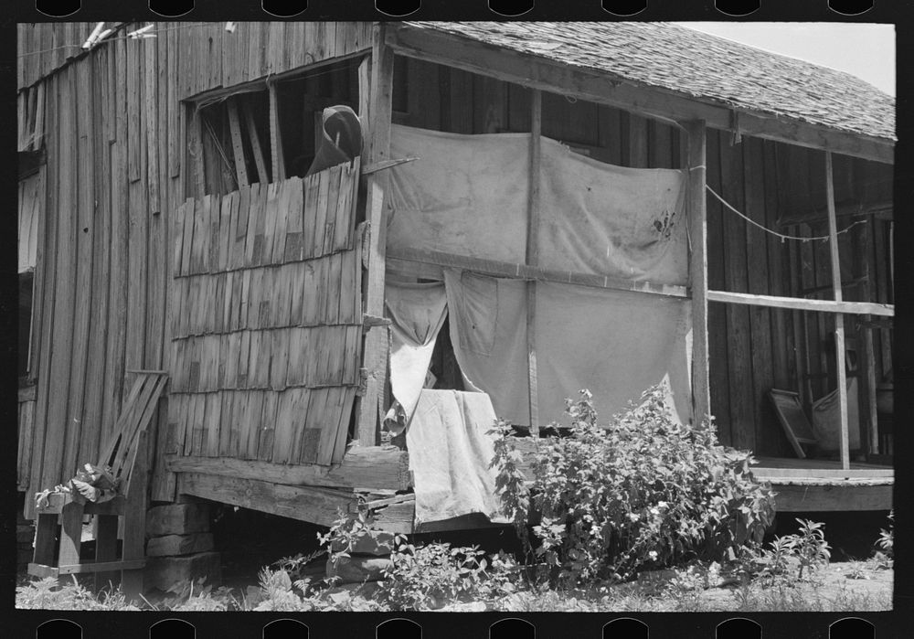 Porch of WPA (Work Projects Administration) worker who was tenant farmer until a few years ago, near Sallisaw, Oklahoma by…