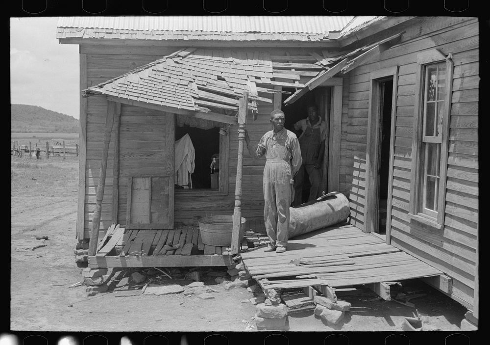 [Untitled photo, possibly related to:  tenant farmer on his front porch. This farm is owned by an out-of-state woman and has…