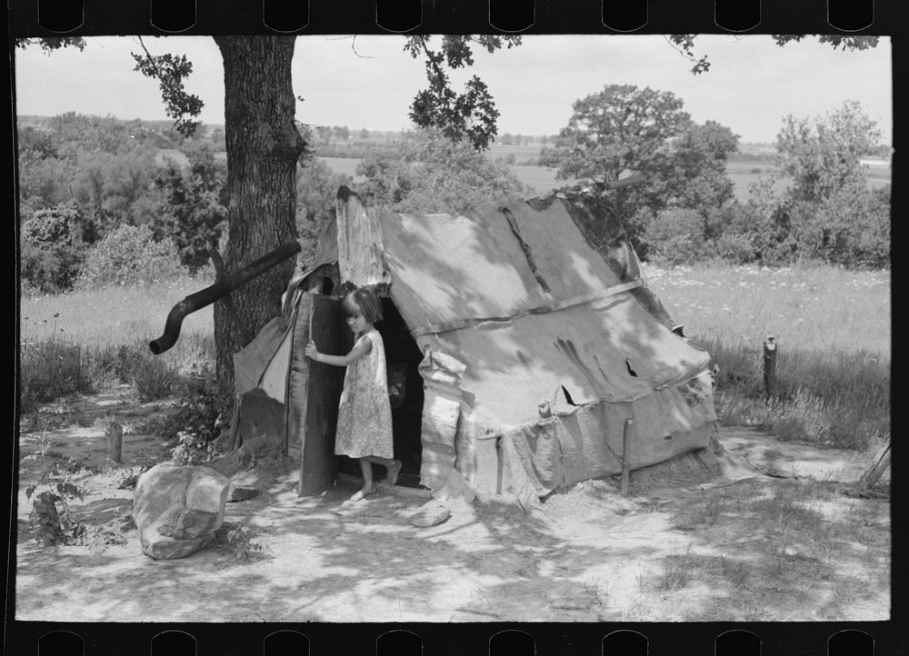 [Untitled photo, possibly related to: Child of agricultural day laborer coming out of tent near Spiro. Sequoyah County…