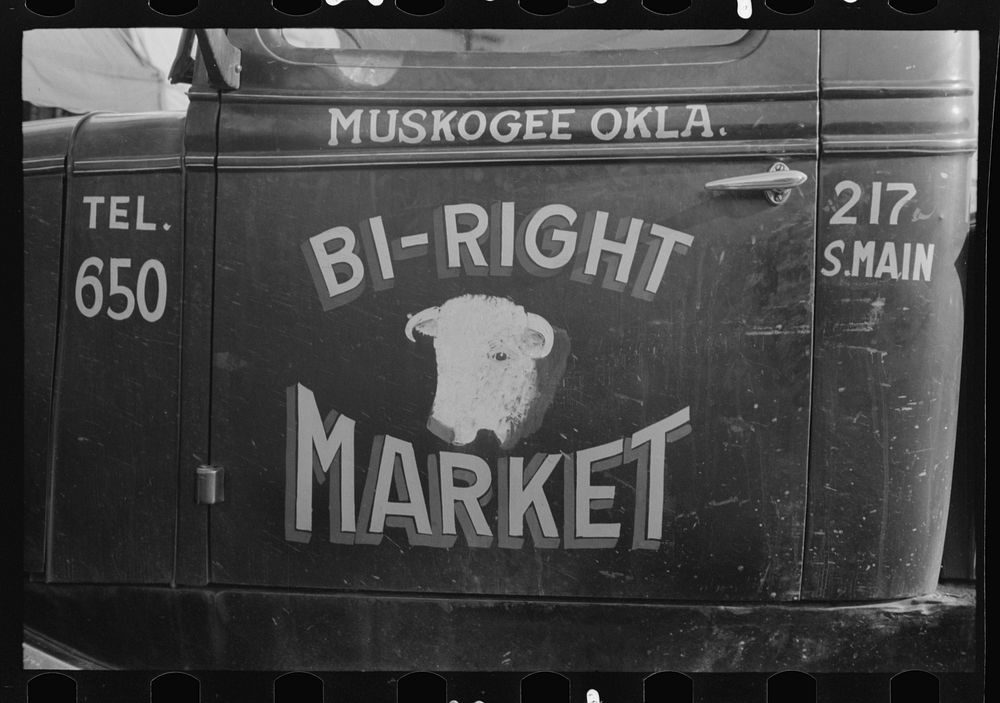 Sign on side of truck, Muskogee, Oklahoma by Russell Lee