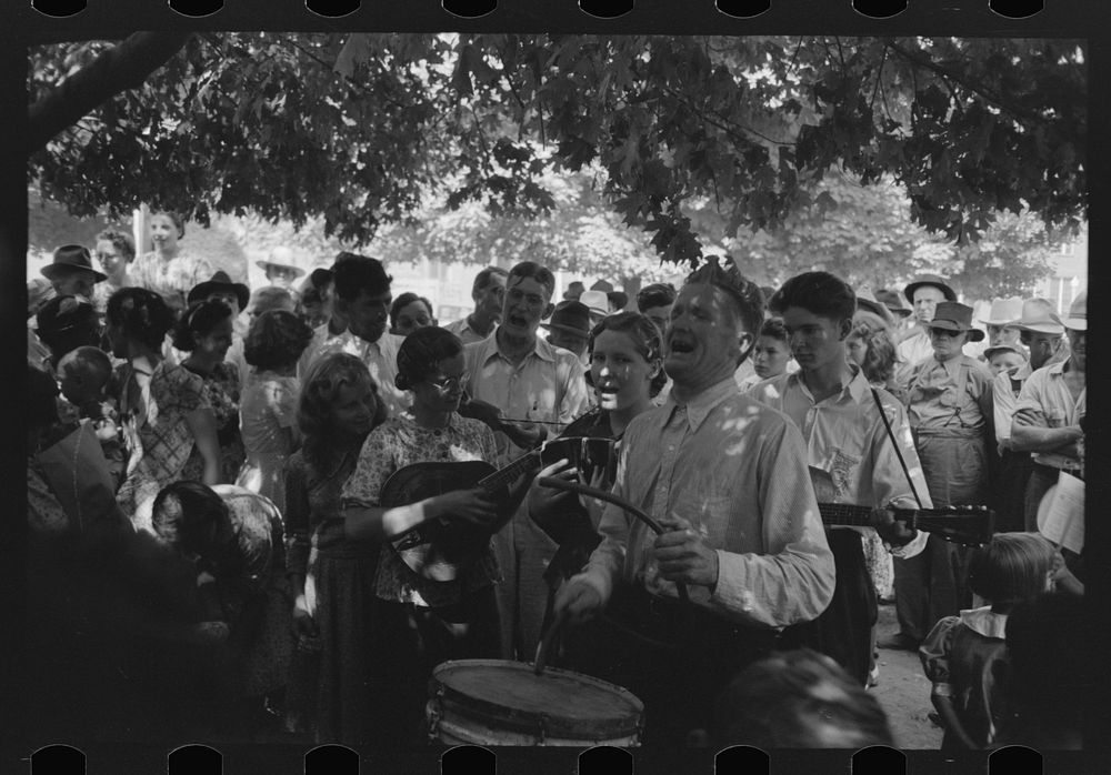Revivalist rally under tree in square, Saturday afternoon, Tahlequah, Oklahoma by Russell Lee