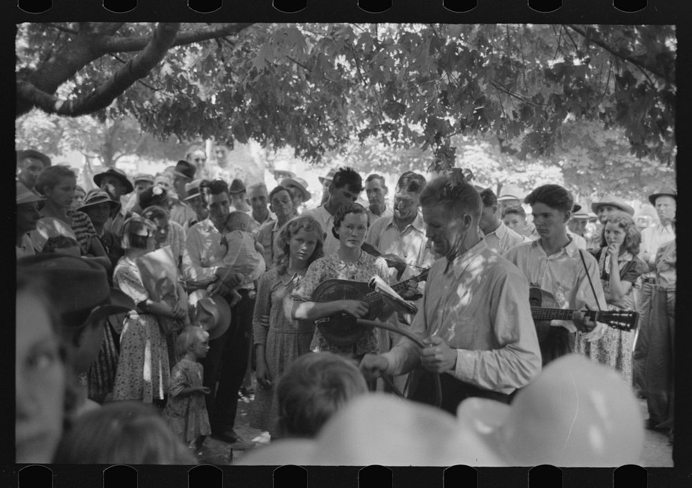 [Untitled photo, possibly related to: Revivalist rally under tree in square, Saturday afternoon, Tahlequah, Oklahoma] by…