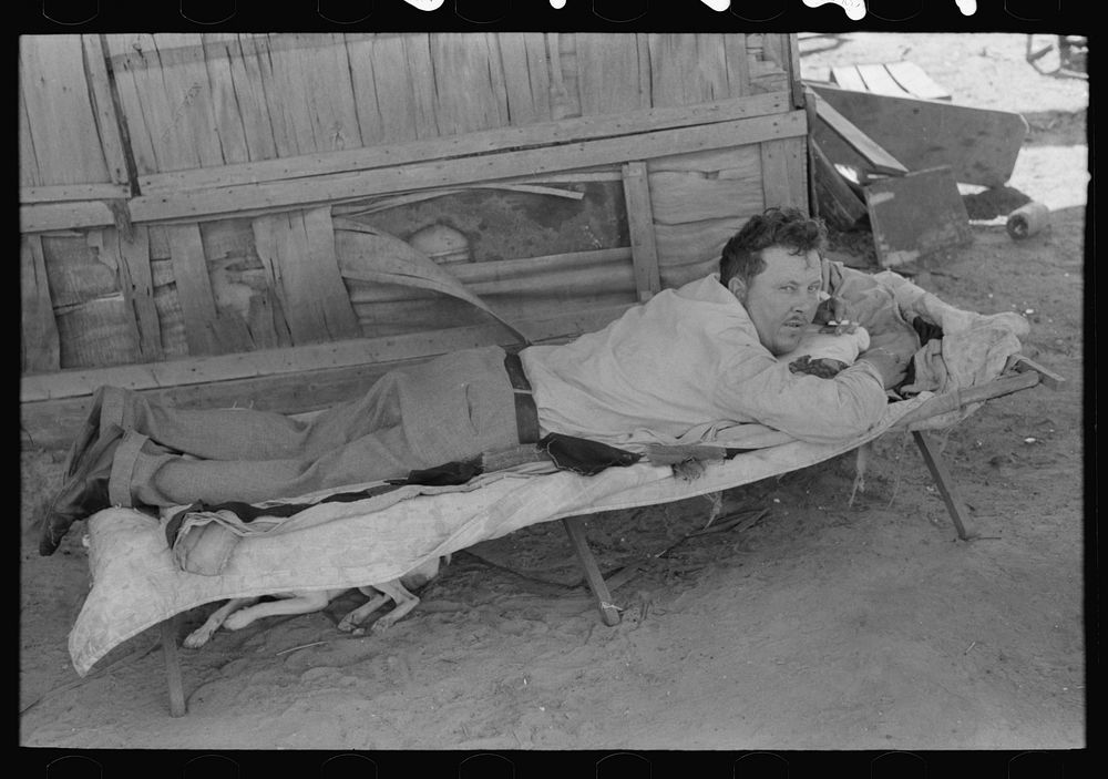 Partially-paralyzed man in May's Avenue camp, Oklahoma City, Oklahoma by Russell Lee