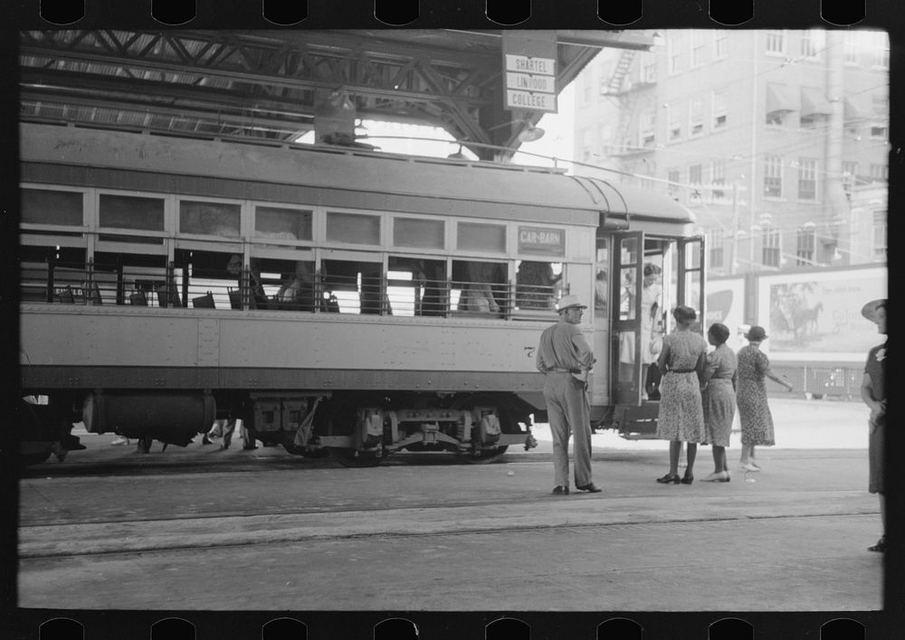 [Untitled photo, possibly related to: People getting off and people waiting to get on streetcar. Terminal, Oklahoma City…
