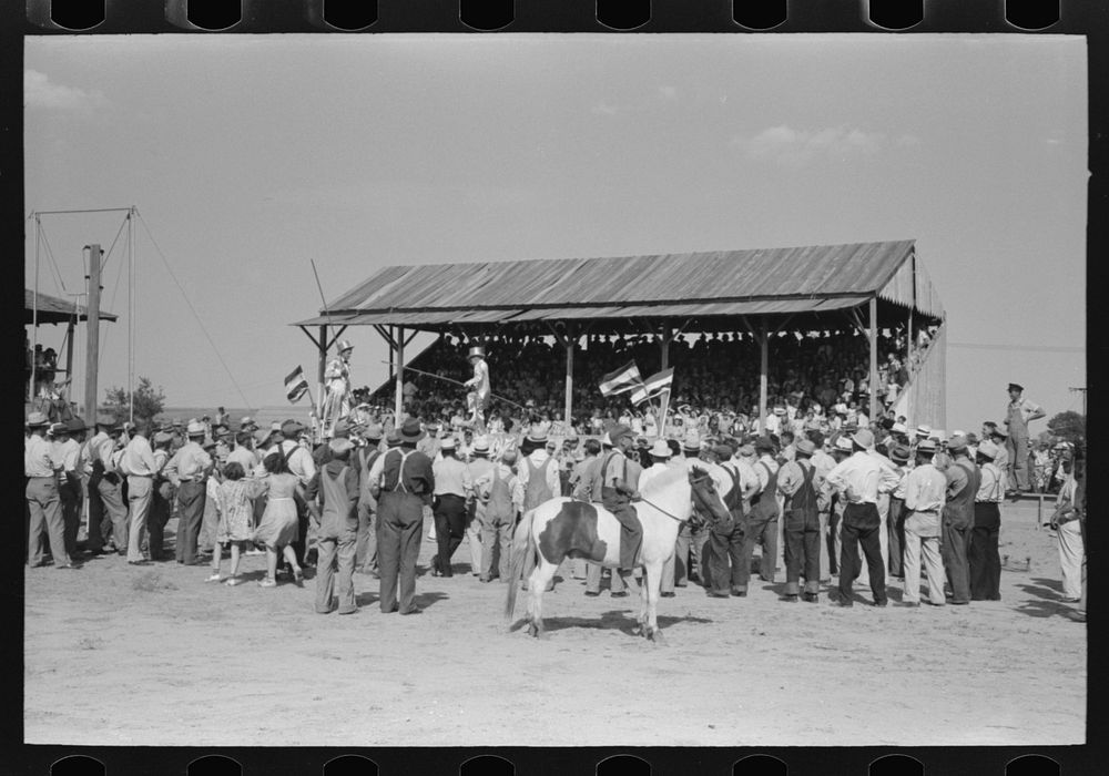 [Untitled photo, possibly related to: Parade of the champions by 4-H Club members at 4-H Club fair, Cimarron, Kansas] by…