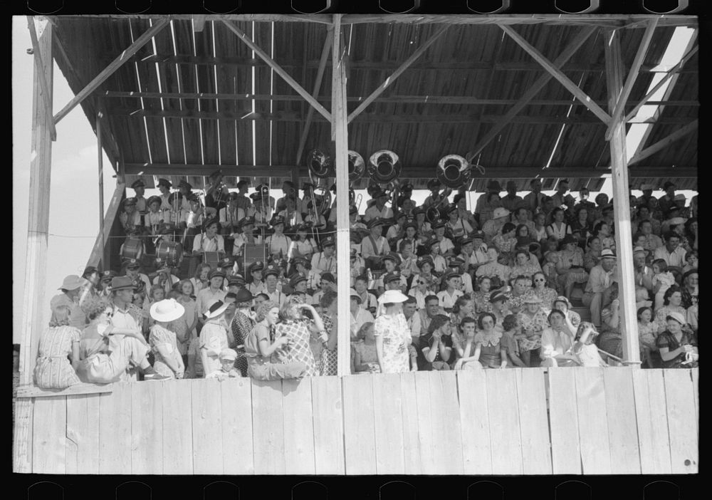 Spectators in the grandstand at 4-H club fair, Cimarron, Kansas by Russell Lee
