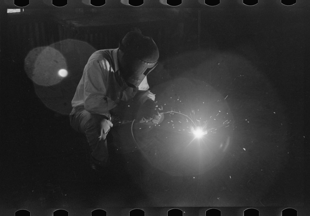 [Untitled photo, possibly related to: Electric welding, an essential part of oil field activities, Seminole, Oklahoma] by…